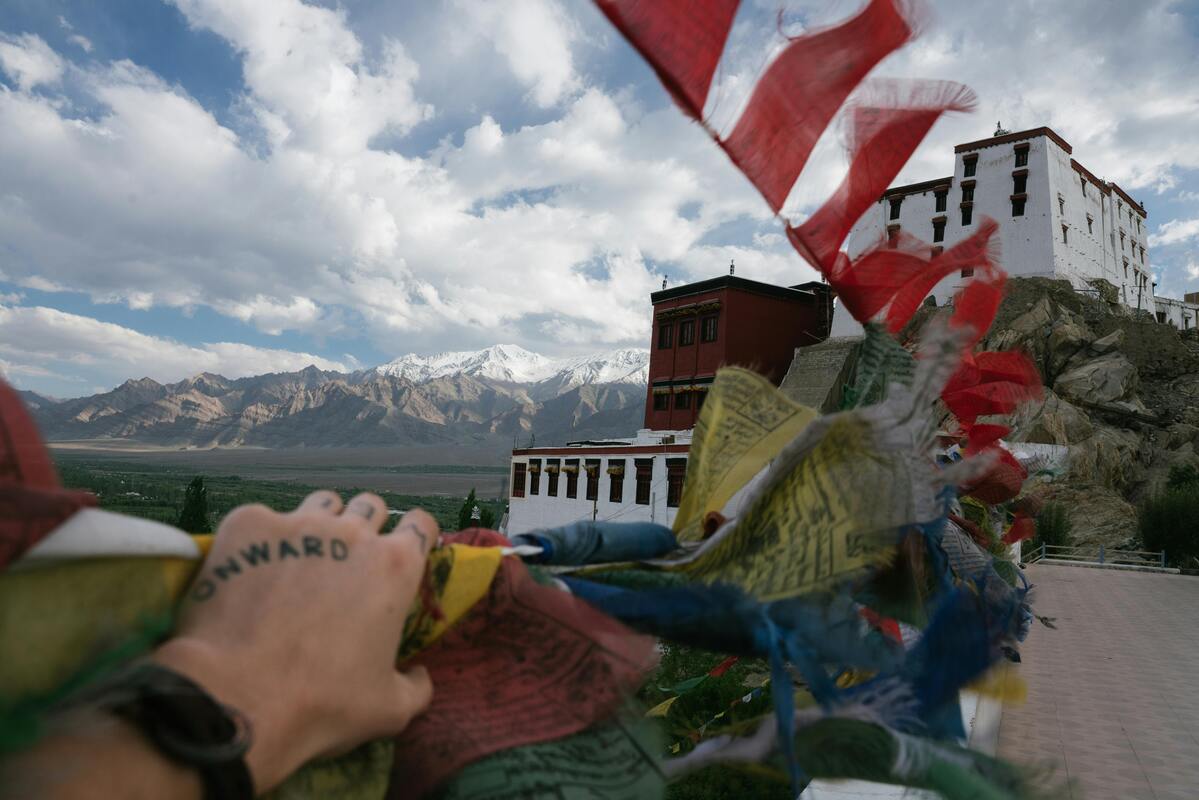 Tourists respecting local customs in a Himalayan mountain village